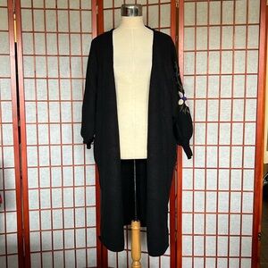 Alice blue size large black cardigan with flower print on both arms woman’s